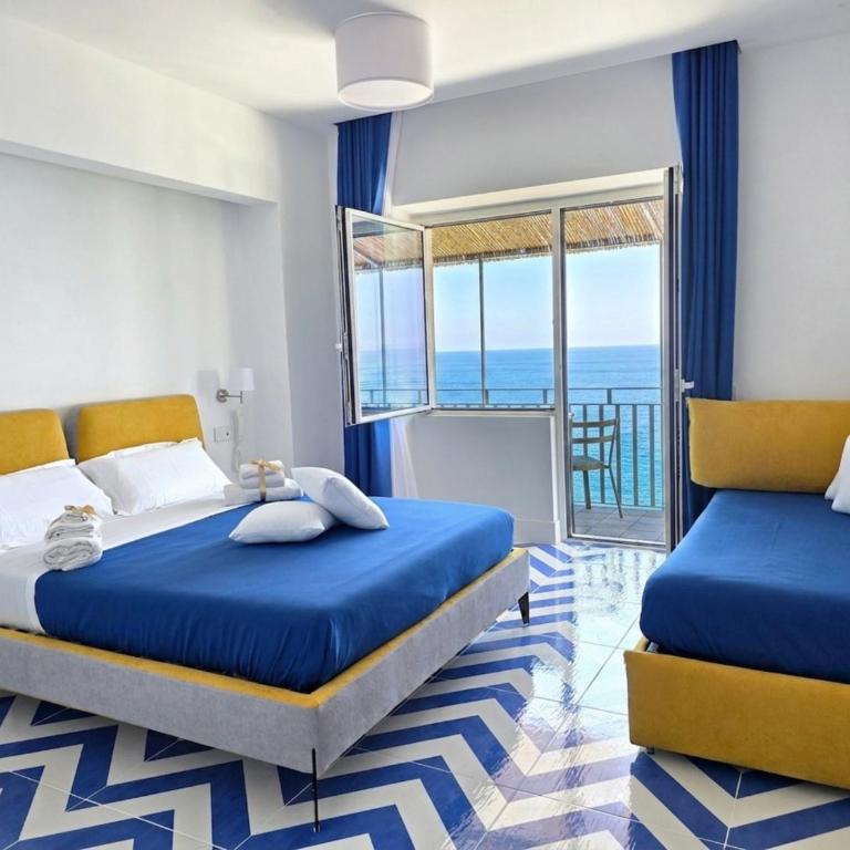 Oasi Relais - Camera Tripla Deluxe con Vista Mare - 1