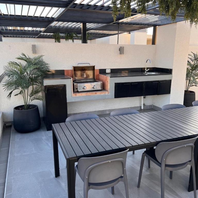 Departamento nuevo en barrio céntrico y tranquilo - One-Bedroom Apartment - 11