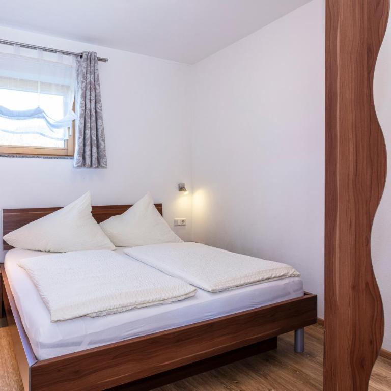 Bergbauernhof Familienparadies Oberhasenberghof - Appartement avec Terrasse - 16