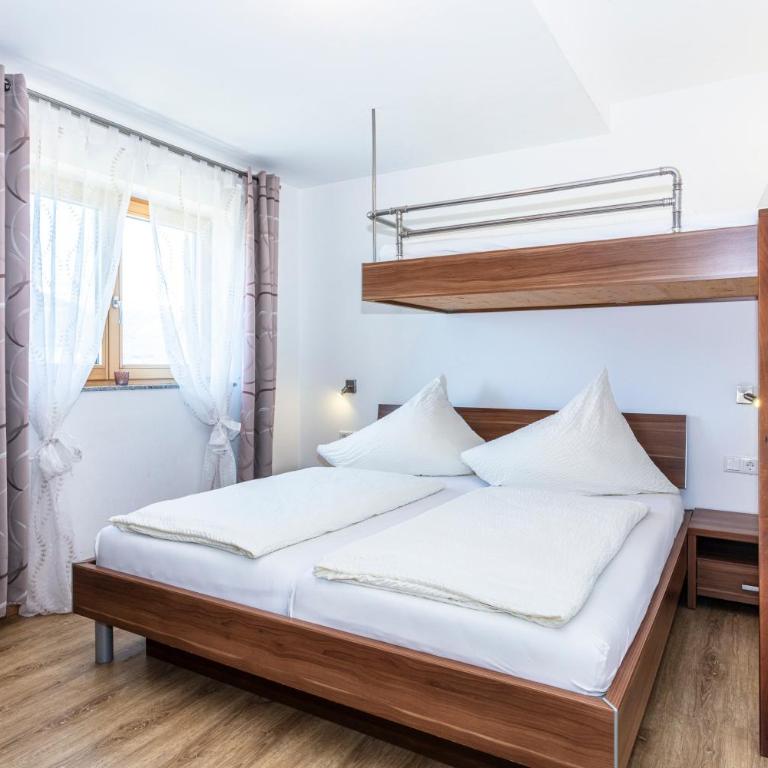 Bergbauernhof Familienparadies Oberhasenberghof - Appartement avec Terrasse - 21