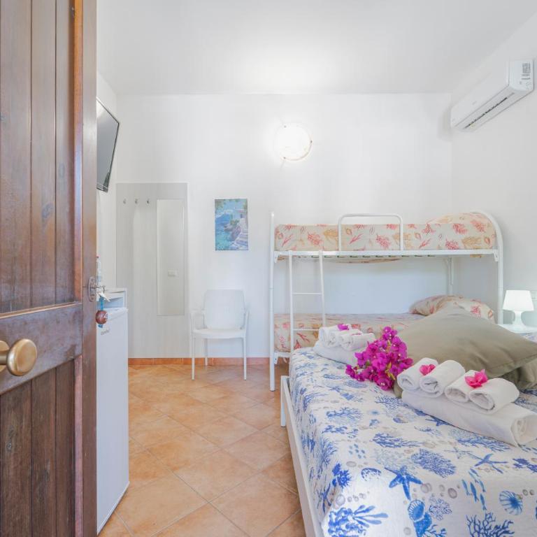 Camping Villaggio Egad - Quadruple Room - 16