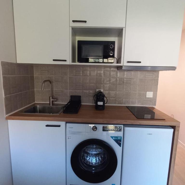 Blue Line - New Modern Studio With Terrace & AC - One-Bedroom Apartment - 13