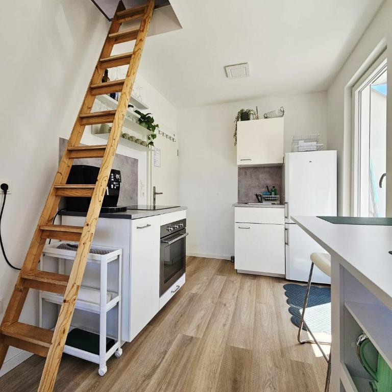 Modernes Tiny City House - 3 Apartments - Apartment mit 1 Schlafzimmer und Balkon - 7