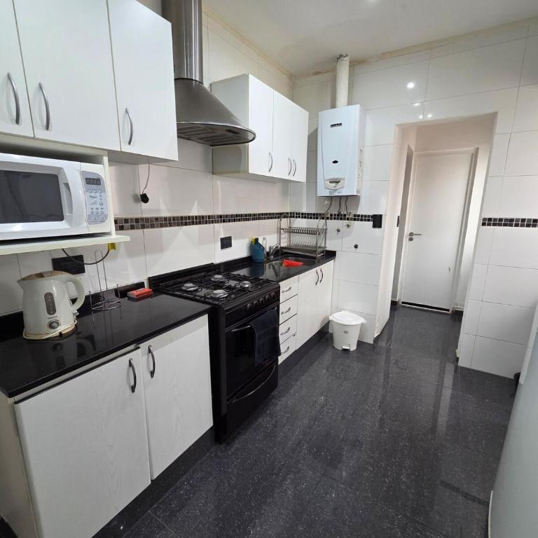 Gran departamento con parrilla y cochera en Playa Grande - Apartamento de 2 dormitorios - 33
