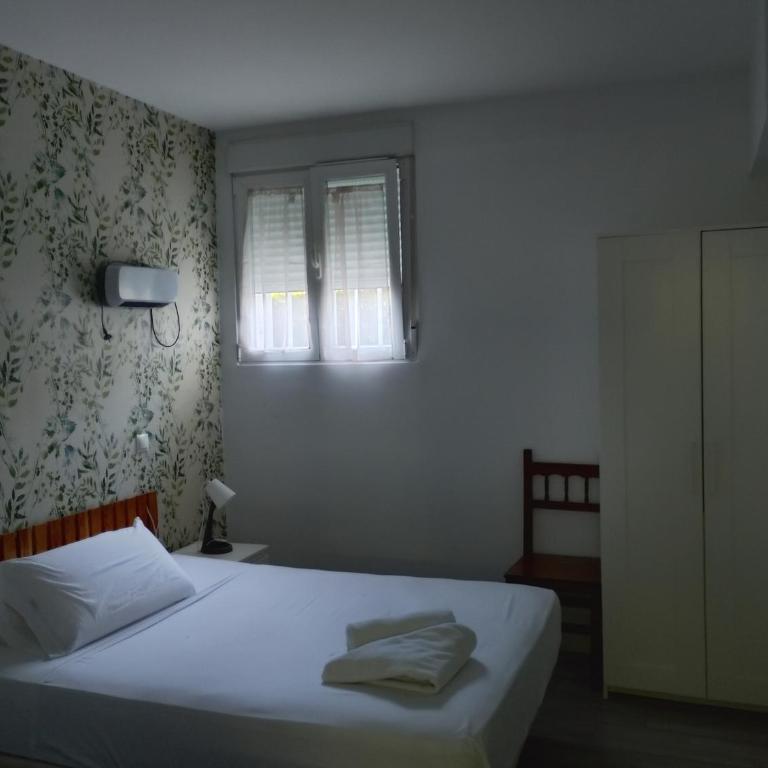 Apartamento y Habitaciones El Colmenar - Habitación Cuádruple Confort - 1