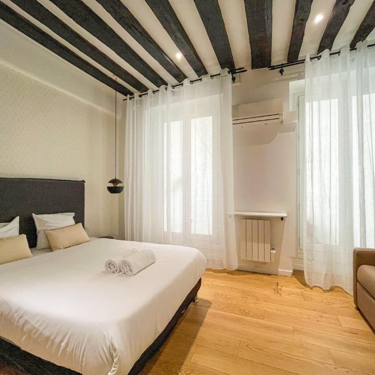 UrbanFlat 69 - Authentic & Elegant Central Paris Home - Apartment - 14