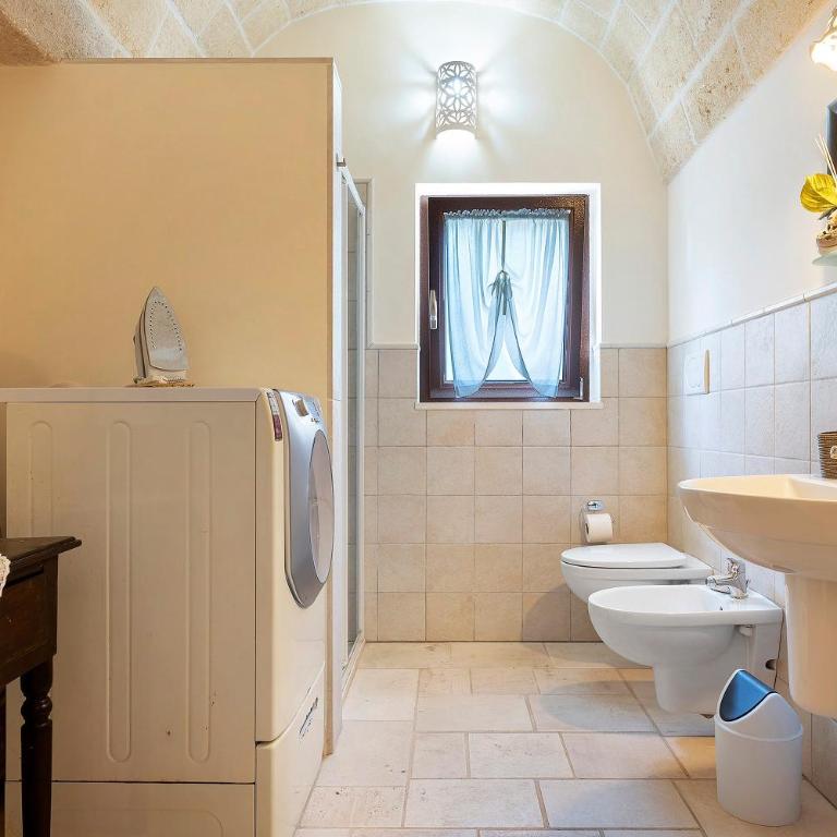 Lamia Pieranna - Appartamento Deluxe con 2 Camere da Letto e Vista Giardino - 15