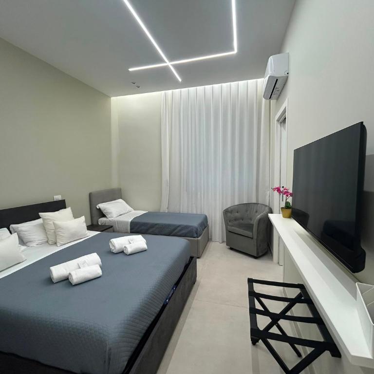 Suite Contè Binario Uno Napoli - Camera Tripla Comfort - 11