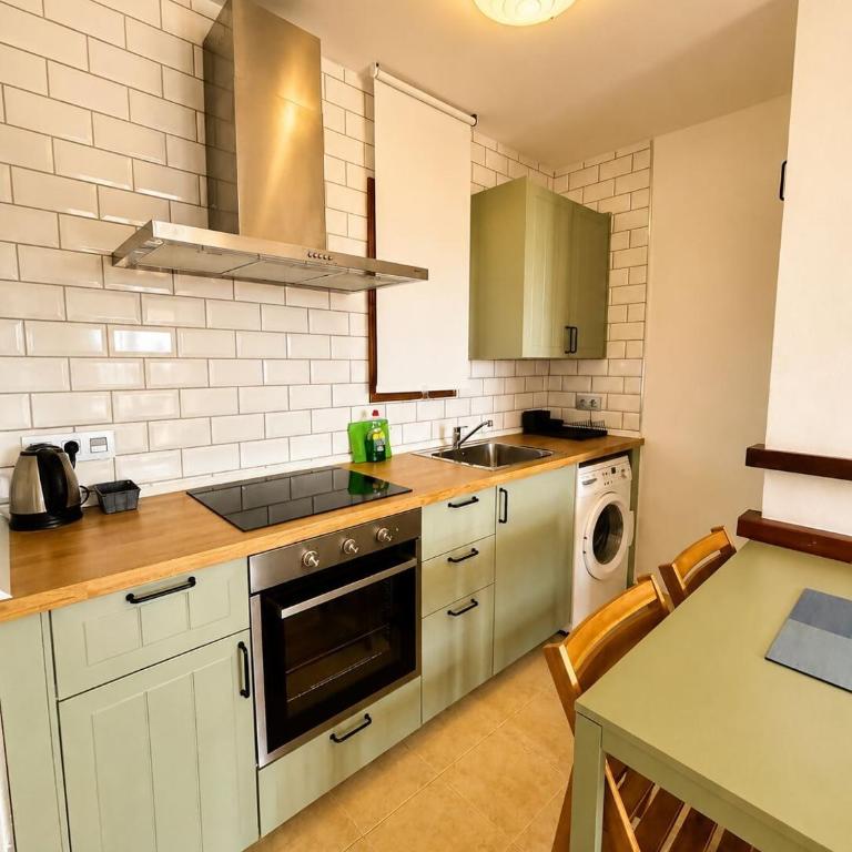 Apartamento con jardín, piscina y parking - Two-Bedroom Apartment - 6