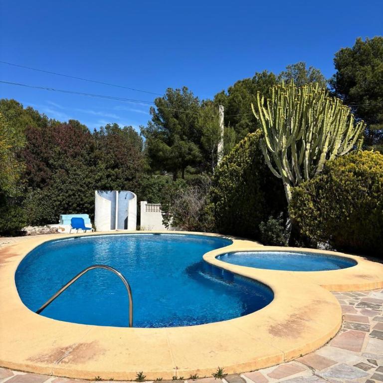 Apartamento con jardín, piscina y parking - Two-Bedroom Apartment - 18