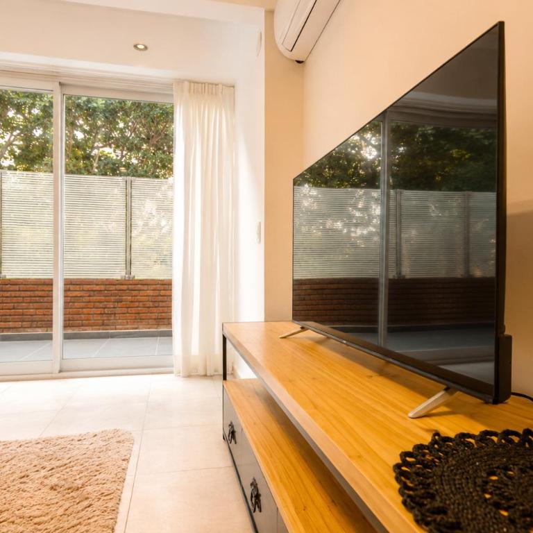 Asombroso departamento con patio - Apartamento de 2 dormitorios - 33