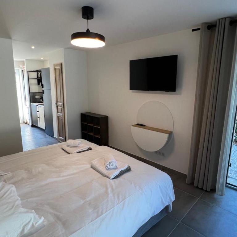 Les Mazets de Provence - Zimmer mit Kingsize-Bett und Gartenblick. - 20