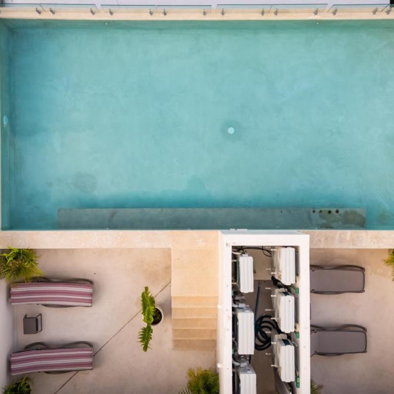 Ideal con rooftop con alberca en la entrada de Zona Hotelera - Apartamento de 2 dormitorios - 26