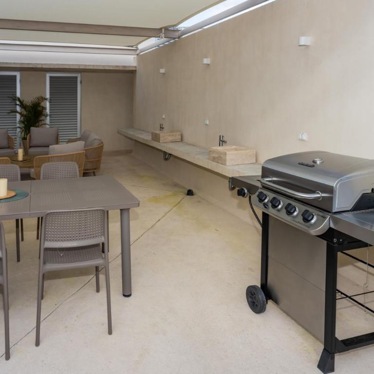 Ideal con rooftop con alberca en la entrada de Zona Hotelera - Apartamento de 2 dormitorios - 40