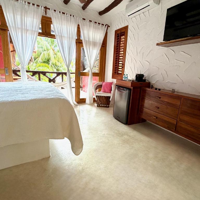 Palapas del Sol - Suite con cama extragrande y vistas al mar - 4