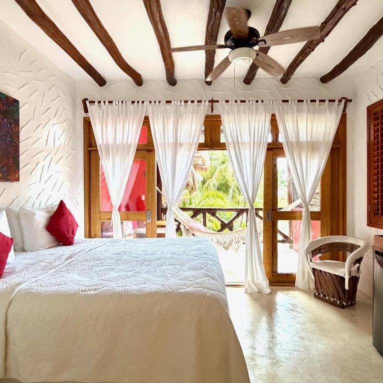 Palapas del Sol - Suite con cama extragrande y vistas al mar - 5