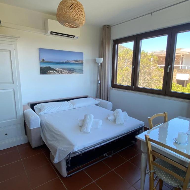 Casa con giardino, Wi-Fi e aria condizionata vicino alla Pelosa - Two-Bedroom Apartment with Sea View - 11
