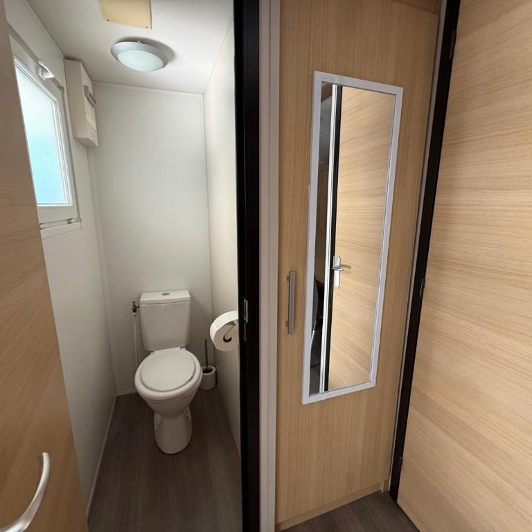 Chalets with kitchen outside at Camping Leï Suves - JoyCasa - Chalet 2 Chambres - 7