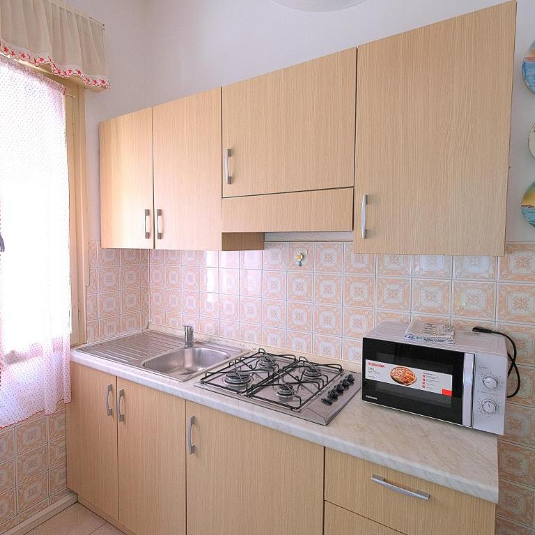 CASA ROSSA TOMASINI Appartamento per famiglie, tre camere , spiaggia compresa - Appartamento con 3 Camere da Letto - 14