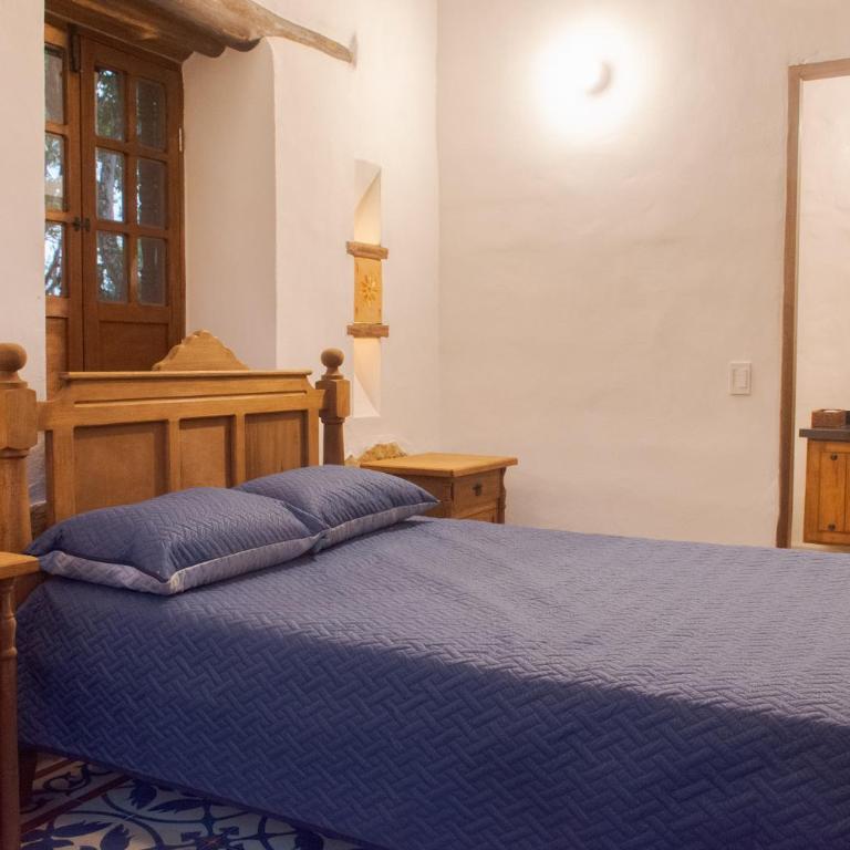 Refugio Ecoturístico Villa Clarita - Habitación Cuádruple con balcón - 4