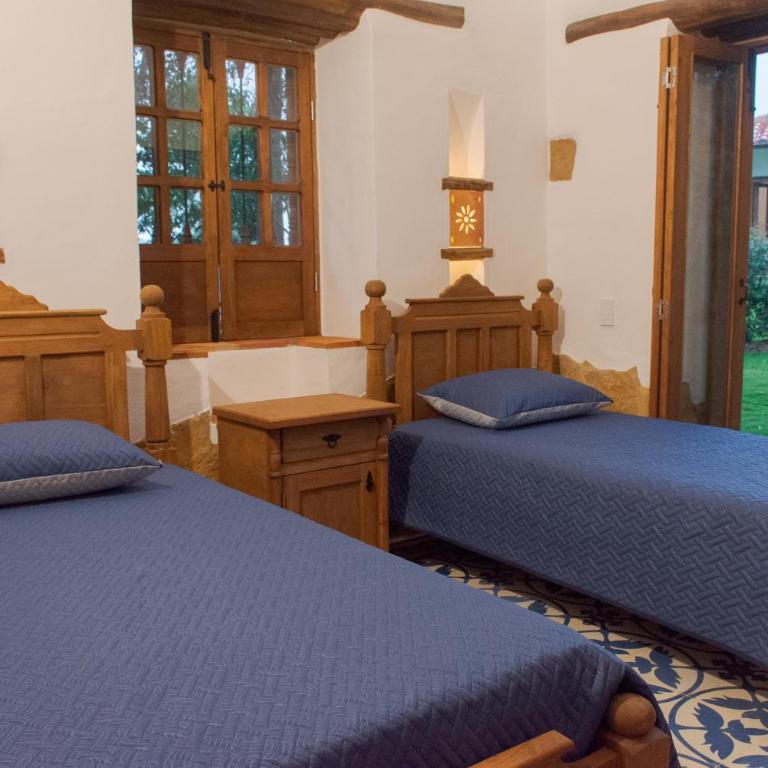 Refugio Ecoturístico Villa Clarita - Habitación Cuádruple con balcón - 6