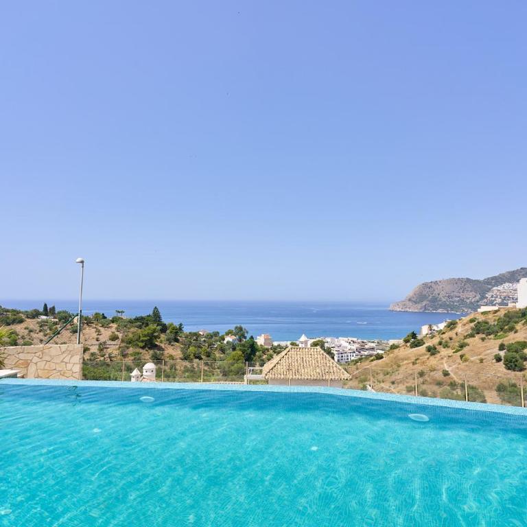 Sunny Sea View Condo with Private Patio, Shared Pool, Amazing Views, Full Kitchen - Two-Bedroom Apartment - 70