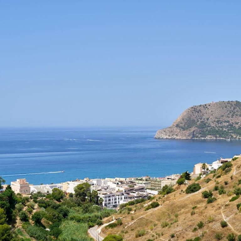 Sunny Sea View Condo with Private Patio, Shared Pool, Amazing Views, Full Kitchen - Two-Bedroom Apartment - 98