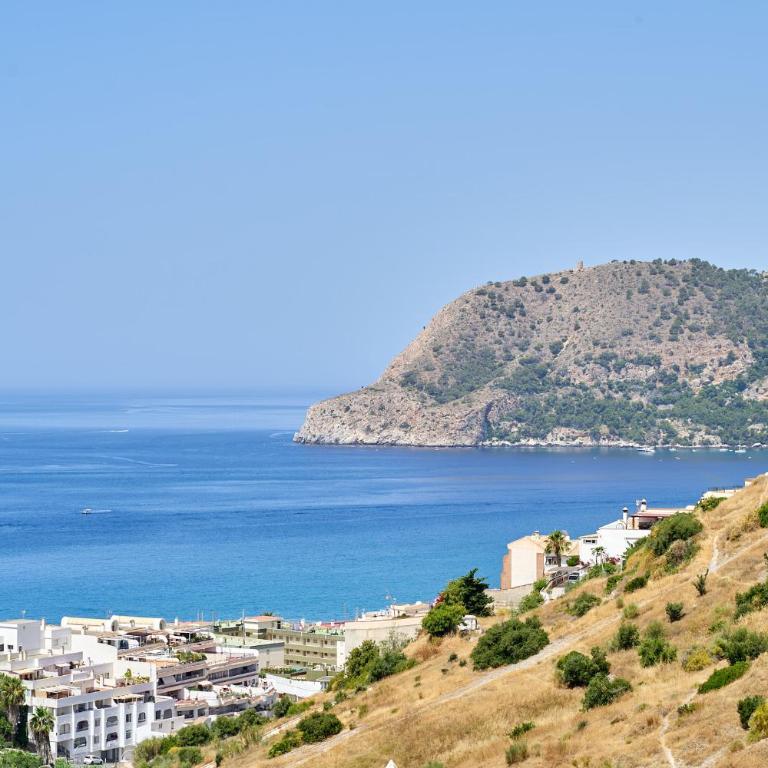Sunny Sea View Condo with Private Patio, Shared Pool, Amazing Views, Full Kitchen - Two-Bedroom Apartment - 93