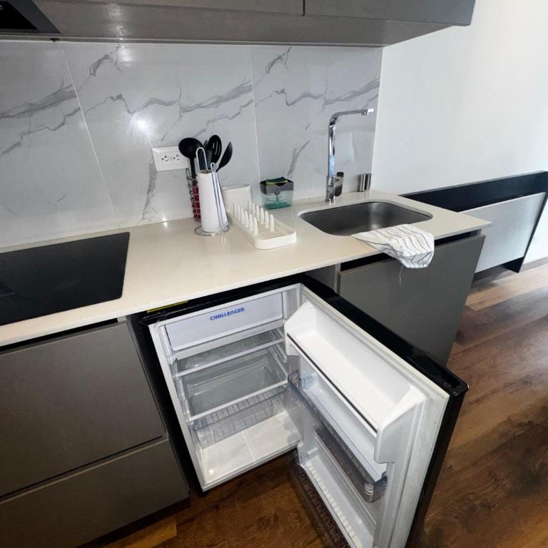 Apartamento 432 de Lujo Exclusivo en Calle 97 con coworking y Rooftop - Apartamento de 1 dormitorio - 26