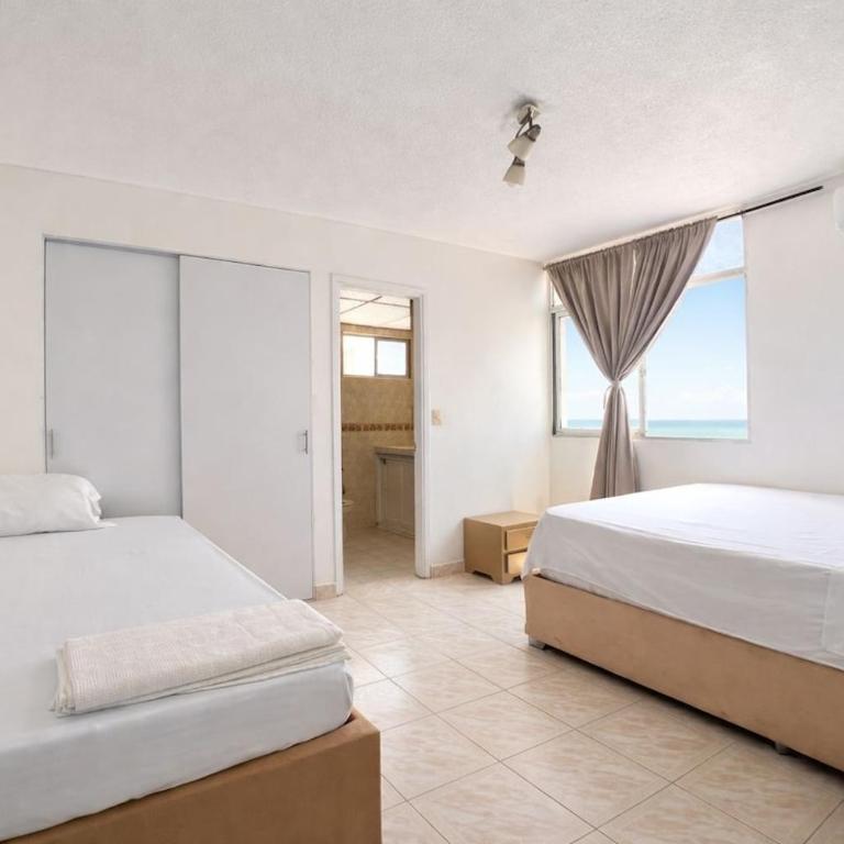 Balcony City Sunset View Sleeps 9 Beach & Pool - Three-Bedroom Apartment - 7