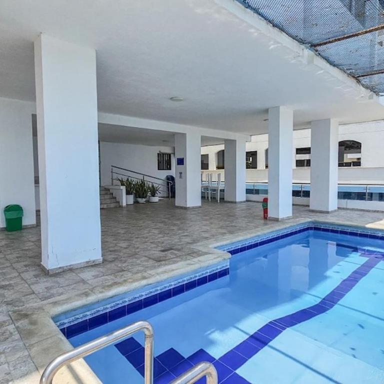 Balcony City Sunset View Sleeps 9 Beach & Pool - Three-Bedroom Apartment - 9