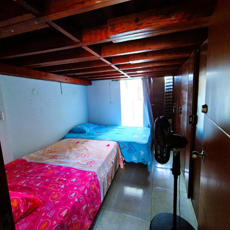 Apartaestudio en 2do piso con balcón, A pocos pasos del Estadio Pascual Guerrero, Hospital Departamental, Imbanaco, Unicancer, Centro Médico San José, Piscinas OByrne, Mulato Cabaret, Univalle, Escuela Deporte, Reservas desde 2 noches en adelante - Two-Bedroom Deluxe Apartment with Balcony - 5