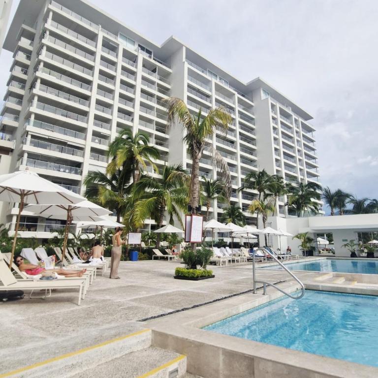 PROMO Beautiful beachfront Apt with pools, jacuzzi, gym - Appartement 1 Chambre - 14