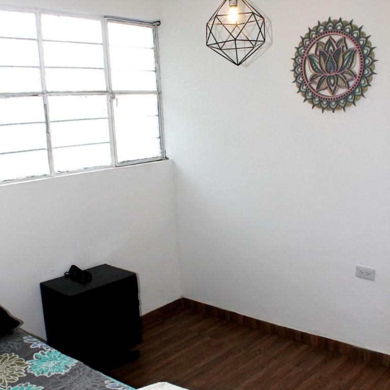 Casa Garza Real Amplia casa para grupos hasta 12 personas en Restrepo - Four-Bedroom House - 24