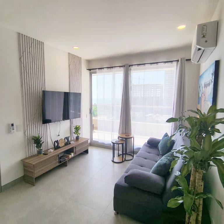 Tu apartamento de descanso cerca al mar - One-Bedroom Apartment with Balcony and Sea View - 9