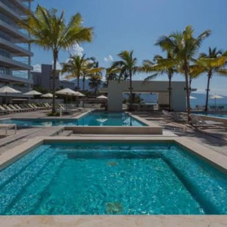 PROMO Beautiful beachfront Apt with pools, jacuzzi, gym - Appartement 1 Chambre - 16
