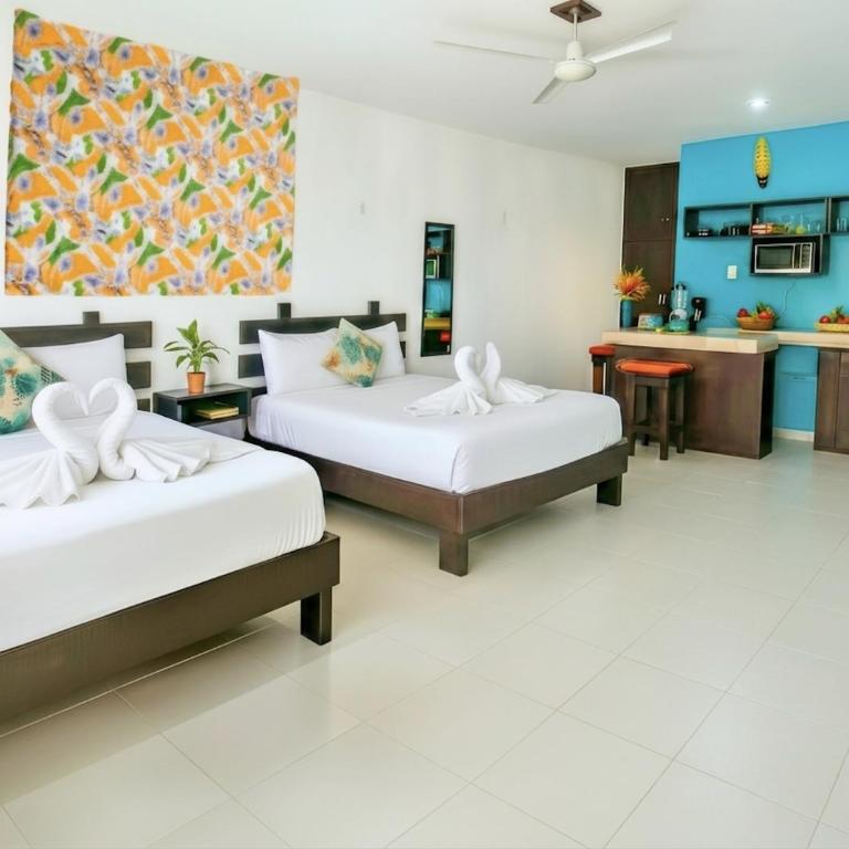 Boutique Romantic King & 2BR Suites, Sleeps 2-8, #1 Beach Mexico & Cenote - 8 Min Walk, Kitchen, Fast WiFi, AC, Bikes - Superior One-Bedroom Apartment with Balcony - 2