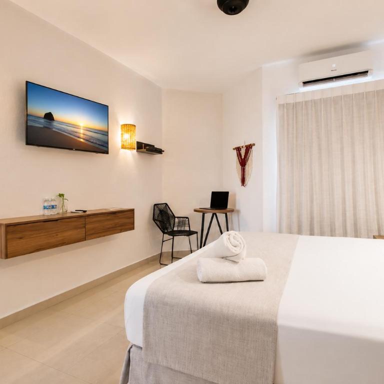 Aruma Suites - Deluxe King Room - 1