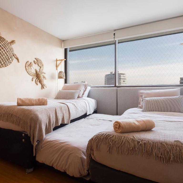 Amplio depto Familiar con aire acondicionado, frente al Parque Arauco - Apartment - 43