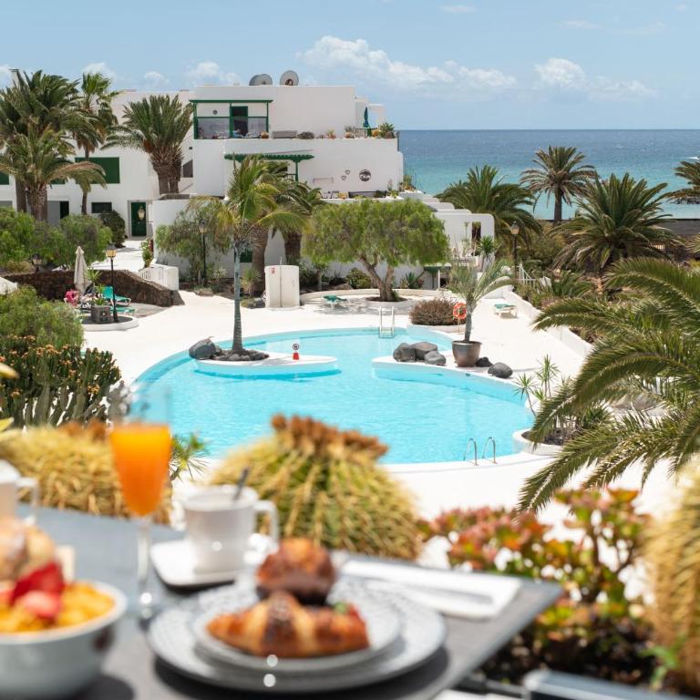 House of the Horizon Playa Las Cucharas VV penthouse with sea & pool view AIRCON - Apartment mit 2 Schlafzimmern, einem Balkon und Meerblick - 24