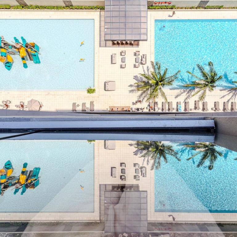 Amplia Suite Moderna con balcón cerca al mar - One-Bedroom Apartment - 1