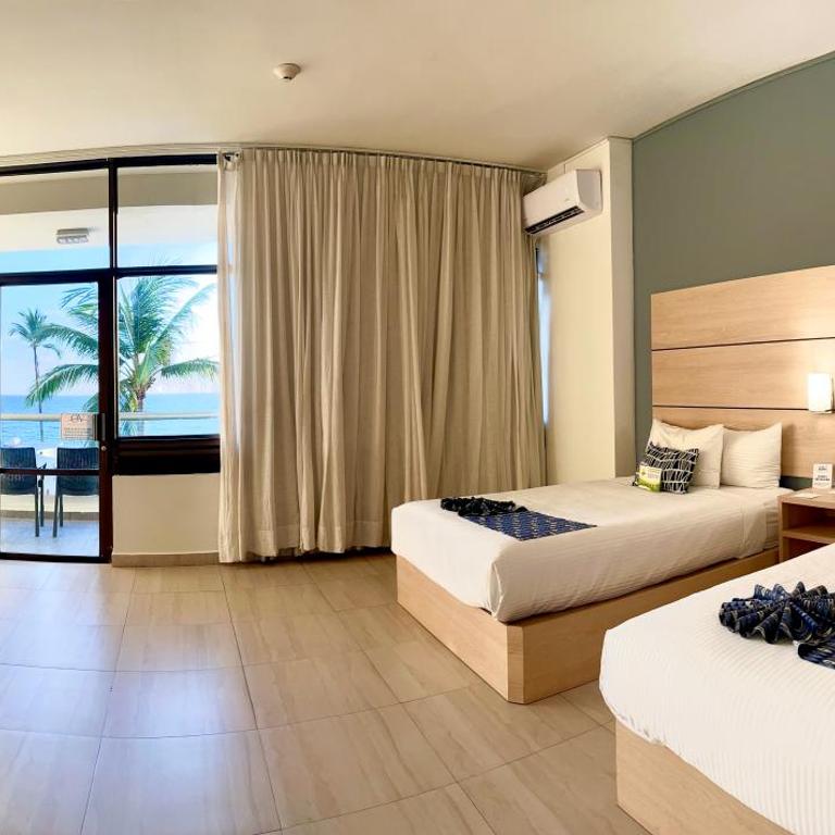 Ocean View Beach Hotel - Habitación Doble con vistas al mar - 2 camas dobles - 1