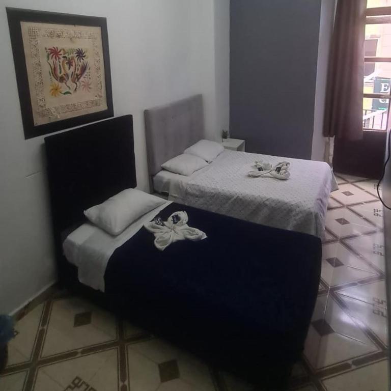 WHOST Hotel y Hostal - Habitación Triple con balcón - 1