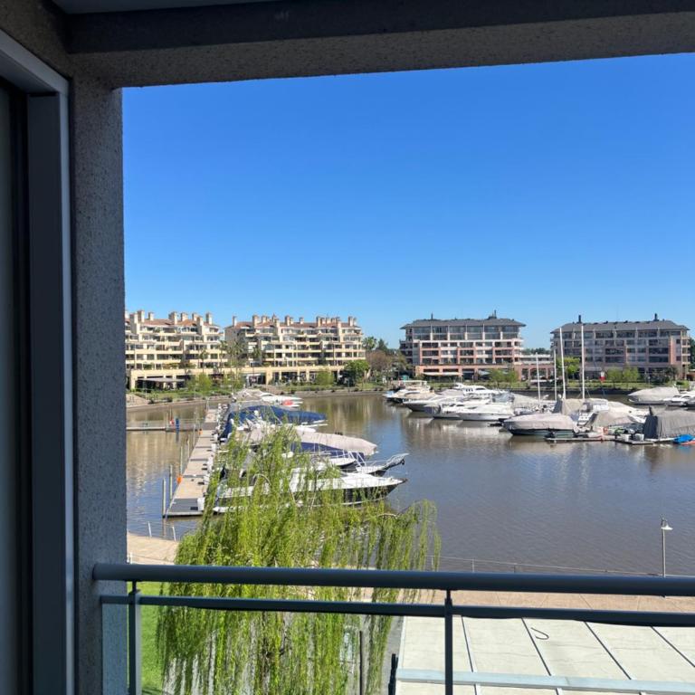 NORDELTA-CONDOMINIOS EN BAHIA GRANDE Dia-Semana-Mes - Apartamento de 1 dormitorio con balcón y vistas al agua - 10