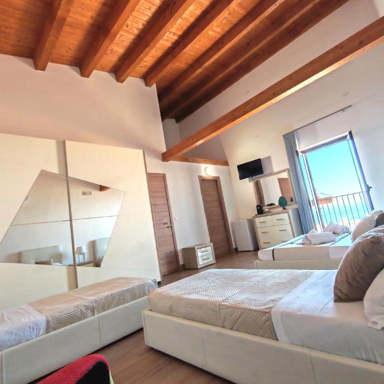Domina Palace Rooms - Camera Quadrupla con Vista Mare - 8