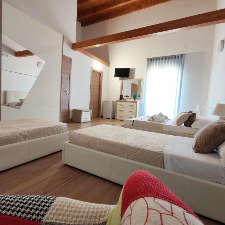 Domina Palace Rooms - Camera Quadrupla con Vista Mare - 11