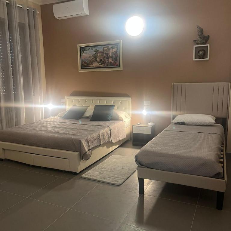 Appartamenti al Sole - Camera Tripla con Bagno Privato - 4