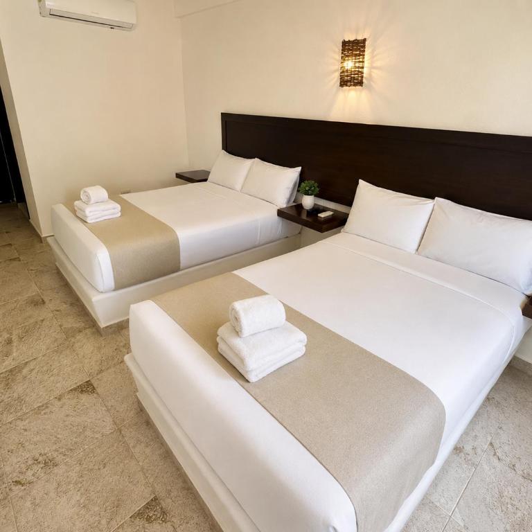 Paseo Kuka by ÓOL Hotels - Habitación Doble Deluxe - 2 camas dobles - 1