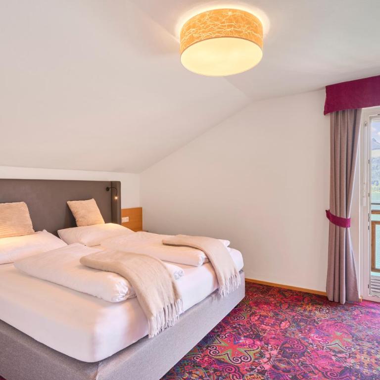 Romantik Residenz (Ferienwohnungen Hotel Im Weissen Rössl) - Dependance - Appartement - Vue sur Lac - 11