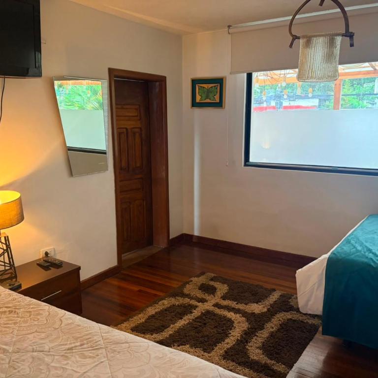 Bed and Breakfast La Uvilla - Habitación Doble Deluxe con cama supletoria - 1